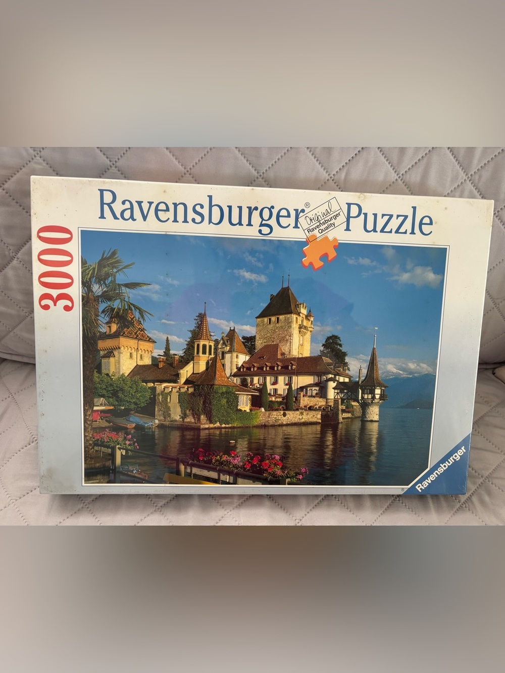 Ravensburger Scenic Castle Puzzle with Blue Sky and Water Hues